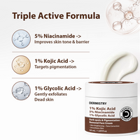 A skincare cream jar labeled DERMISTRY Triple Active Formula, shown on a clean white background with descriptive text and ingredient callouts. The jar is white with brown text and a brown lid, and a thick cream swirl is displayed above it.
