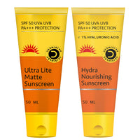 Two squeeze tubes of Damisity Ultra Lite Matte Sunscreen and Damisity Hydra Nourishing Sunscreen side by side on a white background.